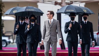 British racing driver George Russell, who races for Williams, arrives at the Yas Marina paddocks area. Victor Besa/The National.