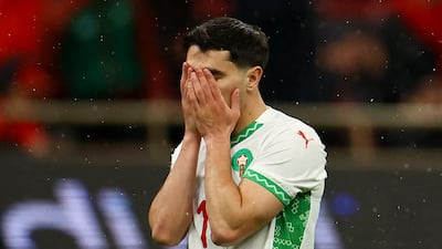 Morocco's Brahim Diaz looks dejected after missing his penalty against Senegal. Reuters