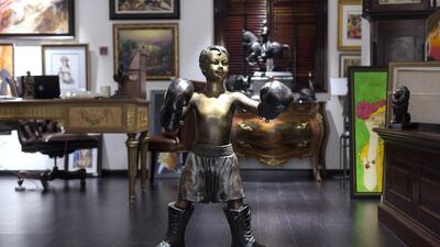 Tim Boswell's collection started as a way to spruce up his office on The Palm and spend some of the money he had made in the Dubai property market. Clint McLean for The National