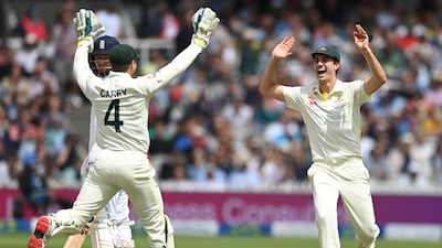 Australia's Pat Cummins and Alex Carey celebrate the wicket of Jonny Bairstow. Getty
