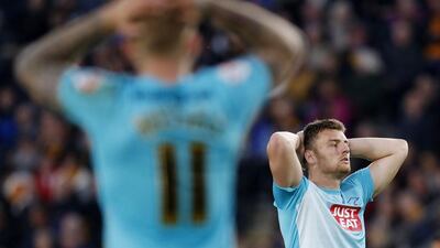 Derby’s Chris Martin and Johnny Russell look dejected. Reuters / Ed Sykes