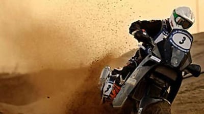 The UAE-based British motorcyclist James West rides his 690cc KTM Rally bike into third place at the UAE Desert Challenge.