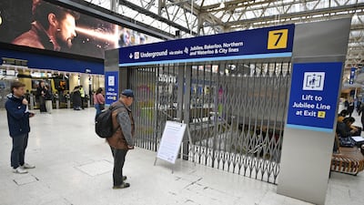 Commuters at Waterloo Station. London Underground advised people not to travel. PA