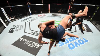 Jessica Andrade takes down Katlyn Chookagian during their women's flyweight bout at UFC Fight Night. Getty