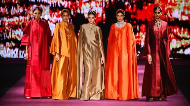 Models on the runway during the spring/summer 2027 Tarun Tahiliani show at Dubai Fashion Week. It was the designer's debut at the event, held in Dubai Design District. Getty Images