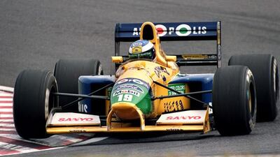 German Formula One driver Michael Schumacher drives his Benetton-Ford during the 2nd practice session of the Japanese Grand Prix 19 October 1991. Schumacher clashed in a high speed turn in the session, clocked 1' 38.363 to clinch the 9th starting position. AFP PHOTO/TOSHIFUMI KITAMURA