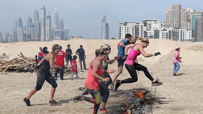 Runner jump over a firey pit.