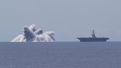 The aircraft carrier USS Gerald R. Ford (CVN 78) completes the first scheduled explosive event of Full Ship Shock Trials while underway in the Atlantic Ocean, June 18, 2021. The US Navy conducts shock trials of new ship designs using live explosives to confirm that warships can continue to meet demanding mission requirements under harsh conditions they might encounter in battle. Photo: US Navy