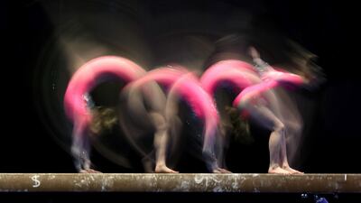Ashlee Sullivan competes on the balance beam dat the 2021 Winter Cup at the Indiana Convention Center in the US, on Sunday, February 28. AFP
