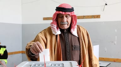 A man casts his ballot in the municipal elections at a polling station in the West Bank city of Hebron in March 2022. EPA