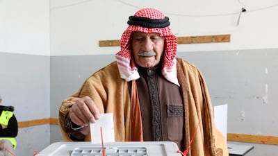 A man casts his ballot in the municipal elections at a polling station in the West Bank city of Hebron in March 2022. EPA
