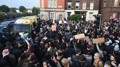 Anti-racist protesters gather outside the Merseyside Refugee Centre in Liverpool. EPA