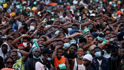 Demonstrators gesture during a protest over alleged police brutality in Lagos, Nigeria on October 17, 2020. Reuters