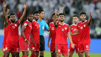 Oman players complain after they think should have had a penalty. Chris Whiteoak / The National