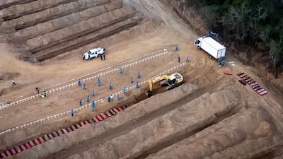 The coffins of victims of the twin earthquakes that rocked Venezuela are buried in Carayaca, La Guaira state. AFP