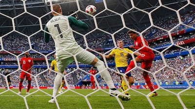 England's Dele Alli scores their second goal. Felipe Trueba/EPA