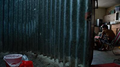 Precarious rooftop houses have for years offered refuge from an unaffordable Hong Kong property market, but some of the city’s poorest residents now face losing their makeshift homes as the government seeks to dismantle them. Anthony Wallace/AFP Photo