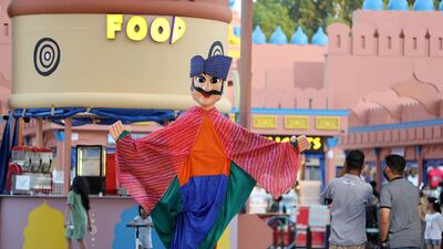 A mascot parades at the India pavilion.