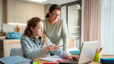 Allow children to arrive at their own answers by asking open-ended questions related to the homework, suggest experts. Getty Images