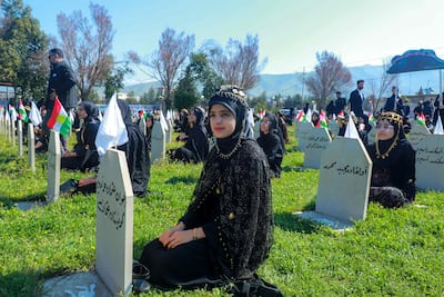 Mourners attending last month's commemorations for the 37th anniversary of the Halabja attack, in which about 5,000 people were killed. AFP