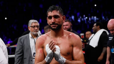 Boxing - Amir Khan v Kell Brook - AO Arena, Manchester, Britain - February 19, 2022 Amit Khan looks dejected after losing the fight Action Images via Reuters / Andrew Couldridge