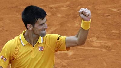Novak Djokovic reacts after defeating Tomas Berdych in the Monte Carlo Masters final on Sunday. Lionel Cironneau / AP / April 19, 2015