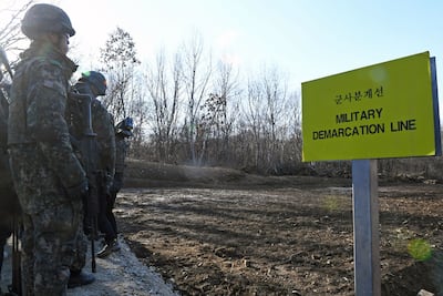 South Korean soldiers at the military demarcation line inside the Demilitarised Zone, in South Korea. AFP