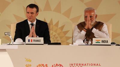 French President Emmanuel Macron and Indian Prime Minister Narendra Modi attend the founding conference of the International Solar Alliance in New Delhi. Ludovic Marin / AFP