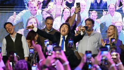 Argentina's President Javier Milei celebrates successful midterm election results with his comrades in government, in Buenos Aires. AFP