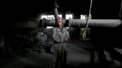 A factory worker takes a break.