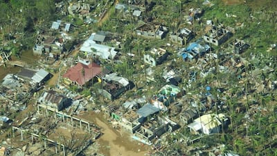 Damaged houses in Surigao City, Surigao Del Norte Province. Reuters