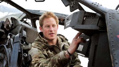Prince Harry during an early morning pre-flight check at Camp Bastion, Afghanistan. AP