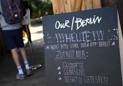 A sign in August 2021 reads "Our Berlin - Today! Please have your Luca App ready, access only: vaccinated, recovered, negatively tested" in front of the entrance at Festsaal Kreuzberg. Getty Images