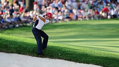 Padraig Harrington, playing an approach shot during the final round at Firestone, says he would relish another face-off with Tiger Woods.
