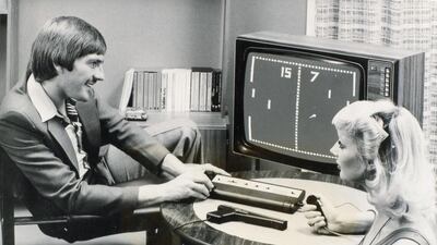 Video games, 1970s style – Former England footballer Steve Heighway plays on an early Videomaster games console. SSPL / Getty Images