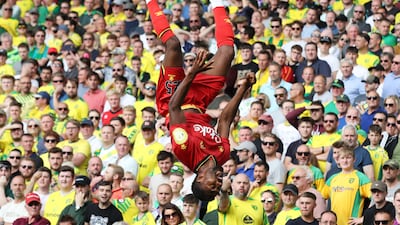 Watford's Emmanuel Dennis celebrates scoring against Norwich City in the Premier League match at Carrow Road on Saturday, September 19. Reuters