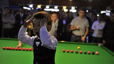 Looks like Wuka is playing against Hendry well past his bedtime. A thorough professional. Reuters