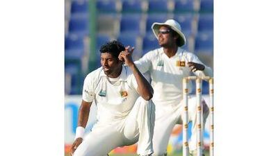 Chanaka Welegedara and the other bowlers laboured throughout the second day without much success. Lakruwan Wanniarachchi / AFP