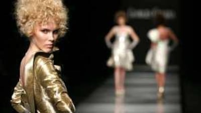 A model wears a creation by the Lebanese designer Georges Chakra in Paris last summer.