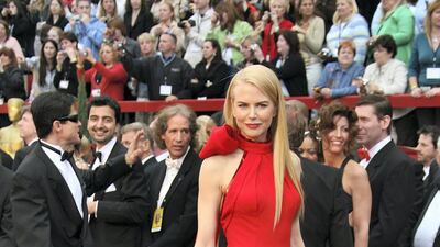 2007: Nicole Kidman opts for a classic red gown by Balenciaga for the 79th Annual Academy Awards. Getty Images