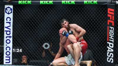 Magomed Ankalaev goes for a crank against Bogdan Guskov at UFC Fight Night.