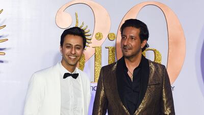 Bollywood music directors and singers Salim (L) and Sulaiman Merchant arrive for the IIFA Rocks of the 20th International Indian Film Academy (IIFA) Awards at NSCI Dome in Mumbai on September 16, 2019