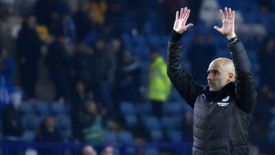 Manchester City manager Pep Guardiola celebrates after the match. AP