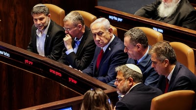 Israeli Prime Minister Benjamin Netanyahu, Finance Minister Bezalel Smotrich, Defence Minister Israel Katz and National Security Minister Itamar Ben-Gvir attend a discussion at the plenum in the Knesset, Israel's parliament, in Jerusalem. Reuters
