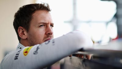 Sebastian Vettel of Red Bull Racing waiting to drive during Day 3 of Formula One winter testing at the Bahrain International Circuit on March 1, 2014. Mark Thompson / Getty Images