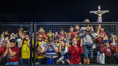 Catholic devotees pray as they take part in the Feast of the Black Nazarene at Quirino Grandstand, Manila. Getty Images