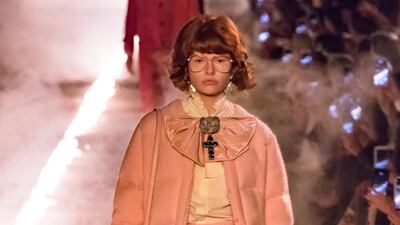 The opening look was a quilted coat and skirt in sugar pink, matched with bright green lace tights. Courtesy of Gucci by Dan Lecca
