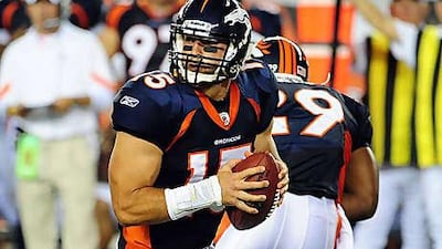 Tim Tebow in action for the Denver Broncos against the Cincinnati Bengals.