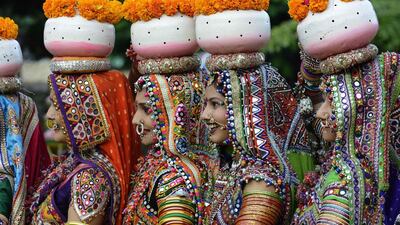 Folk dancers from the Panghat Group of Performing Arts during a dress rehearsal for an event to mark Navratri. AFP