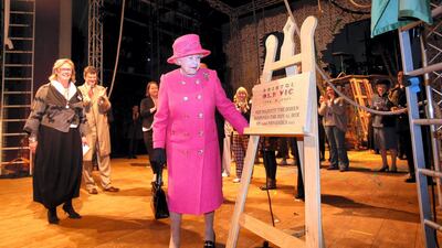 Queen Elizabeth II unveils a plaque to commemorate her visit and the completion of the work at the refurbished Bristol Old Vic in 2012. AFP
